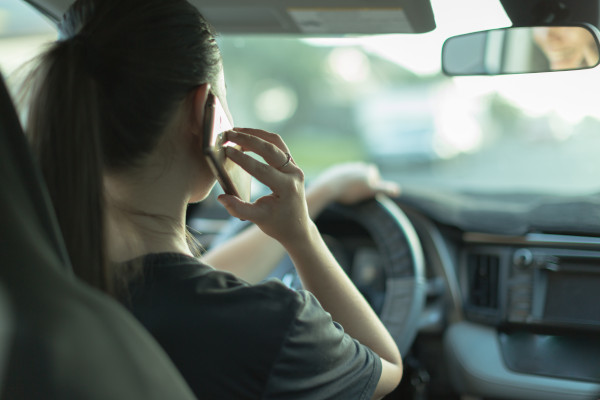 Check-up Media using phone while driving