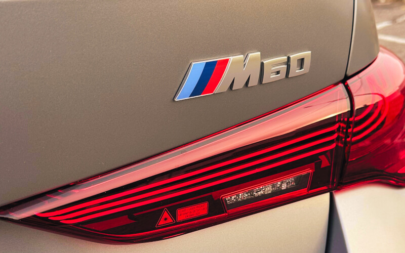 Check-up Media BMW i4 M60 xDrive logo